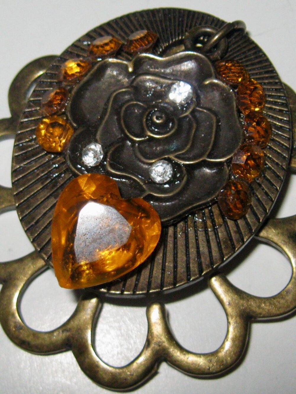 ONE OF A KIND BROOCH DESIGNED FROM YEARS OF COLLECTING JEWELRY FINDINGS & BEADS